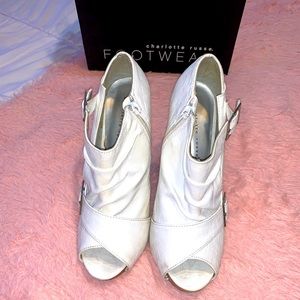Used. Charlotte Russe. Open Toe Booties/Heels. White Color. Size 8.